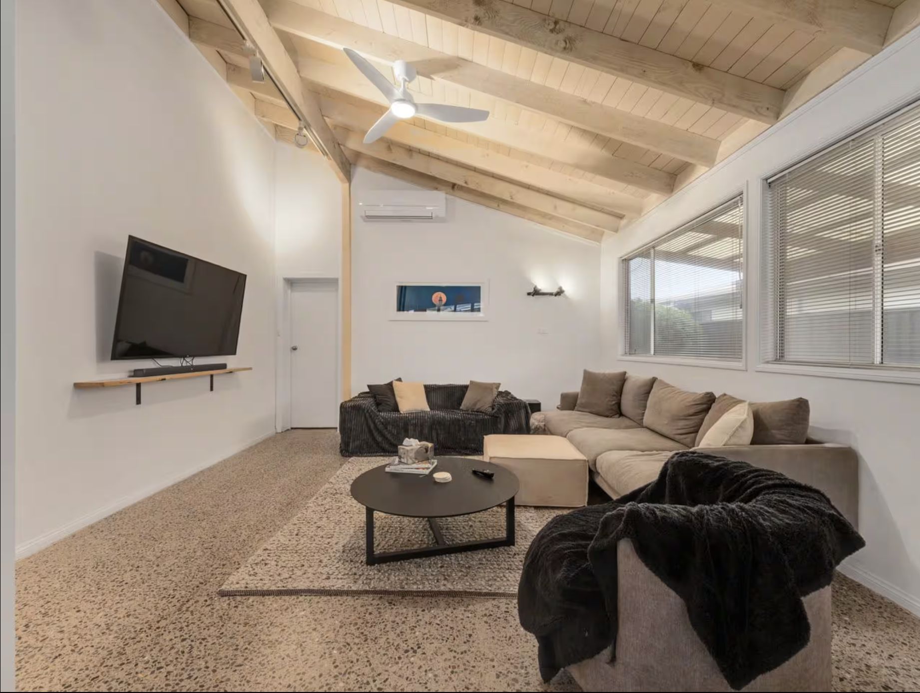 The open living area with the deck beyond