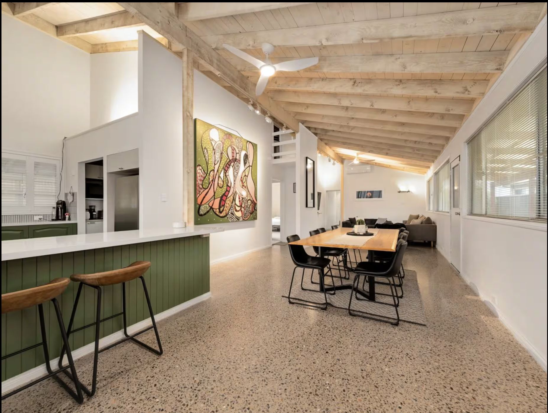 The dining table, seating everyone at once