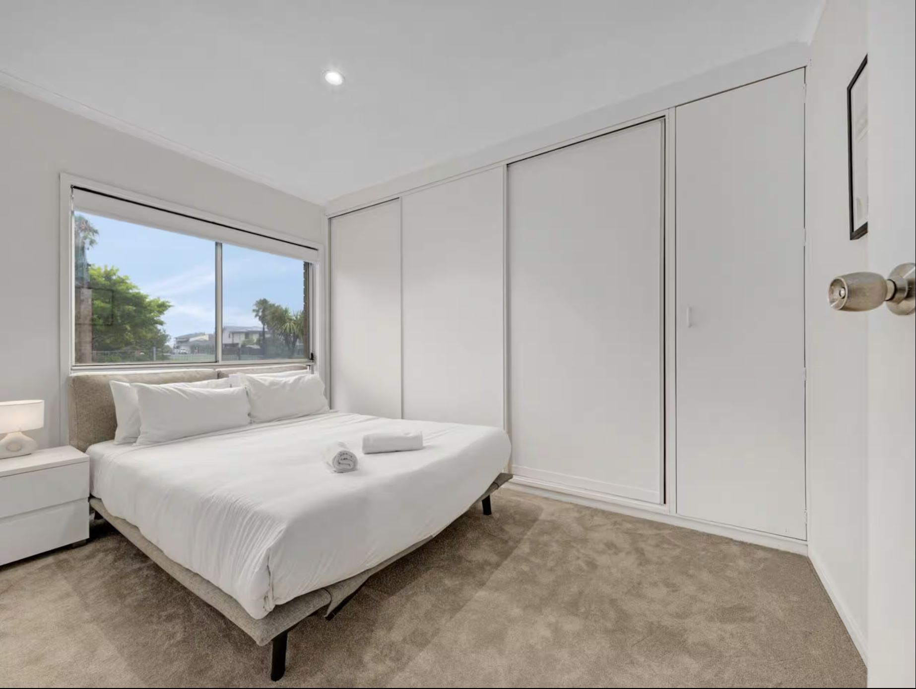 The second bedroom, with a queen bed